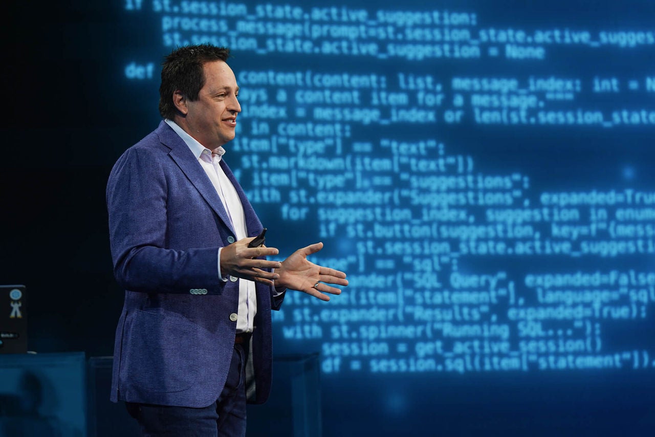 Christian Klinerman on stage at Snowflake BUILD 2024