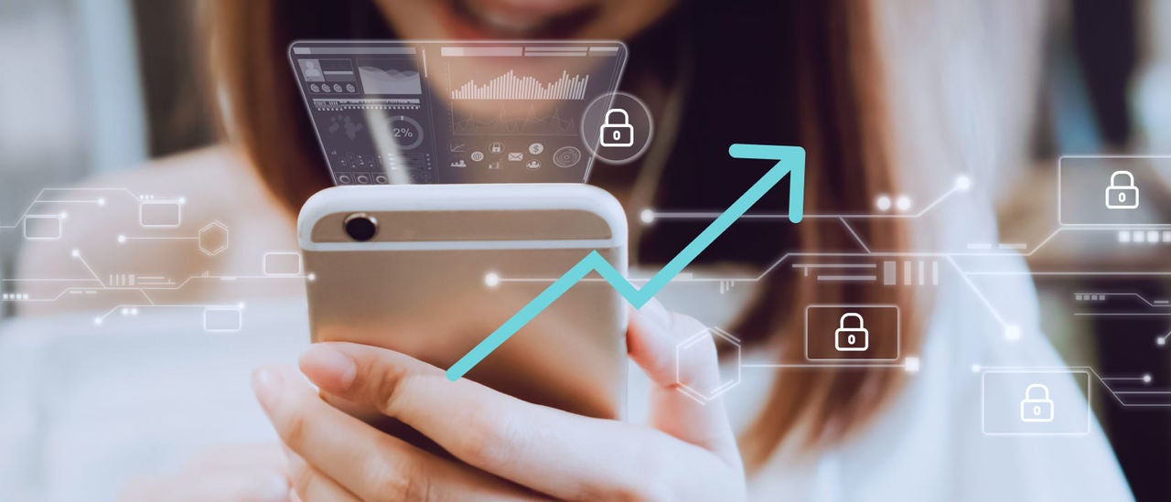 Photo illustration of woman looking at cell phone with overlay of security icons and a blue upward arrow