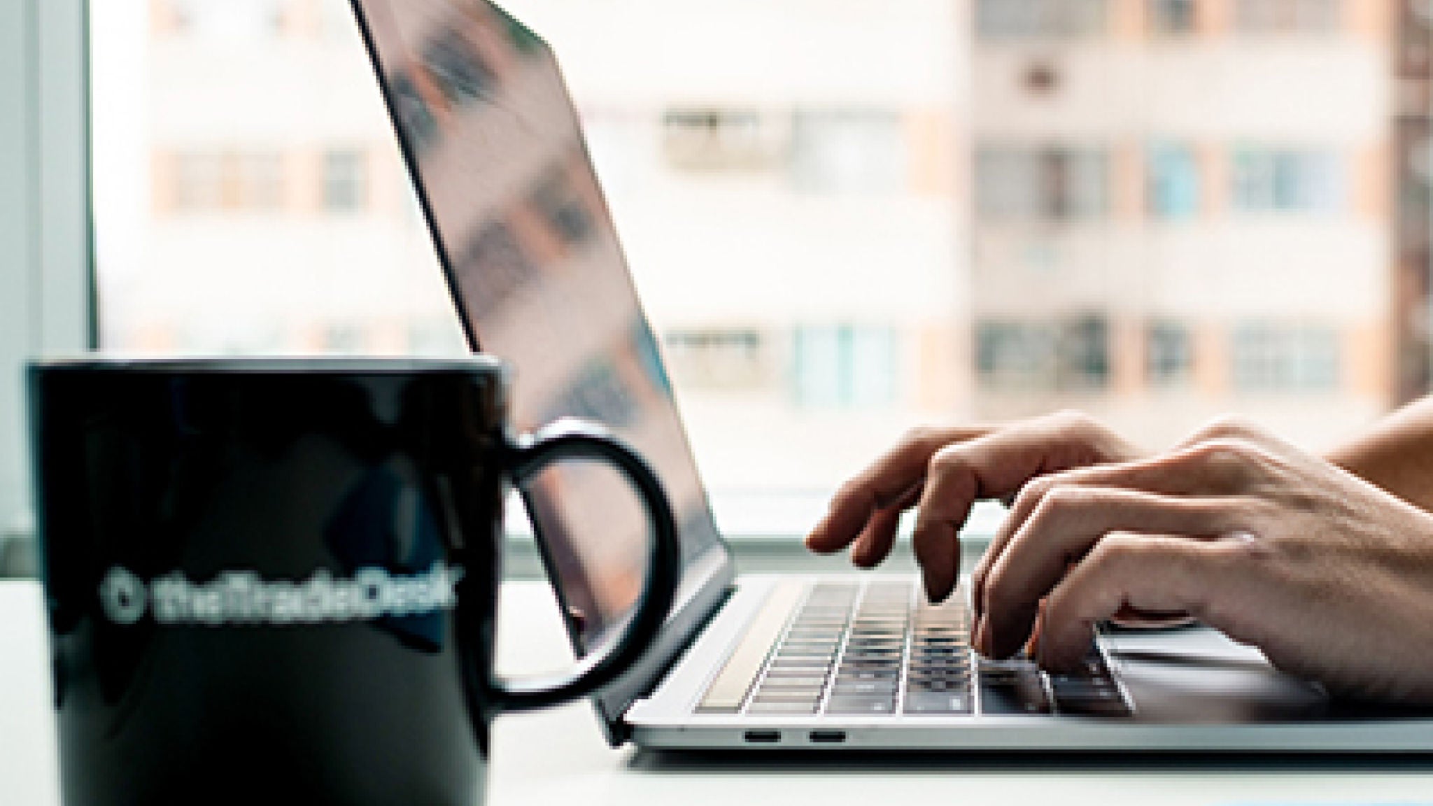 Person typing on a laptop