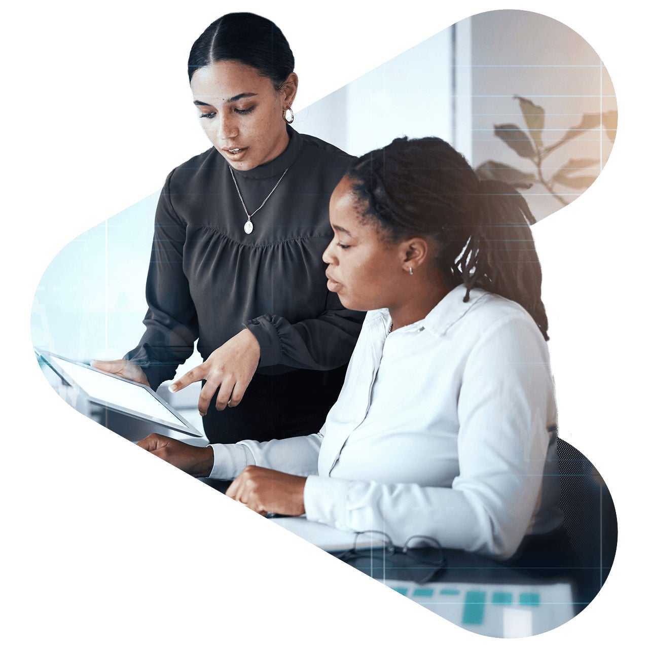 Two professionals collaborating in an office