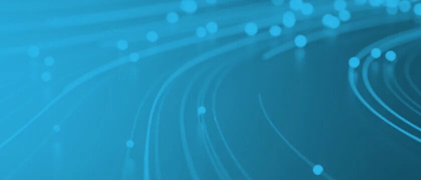 blue gradient graphic with rounded lines and spheres