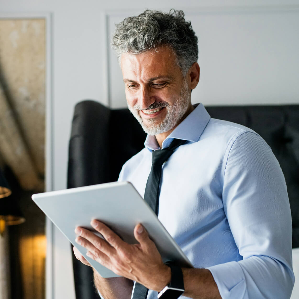 business man using tablet in his hands