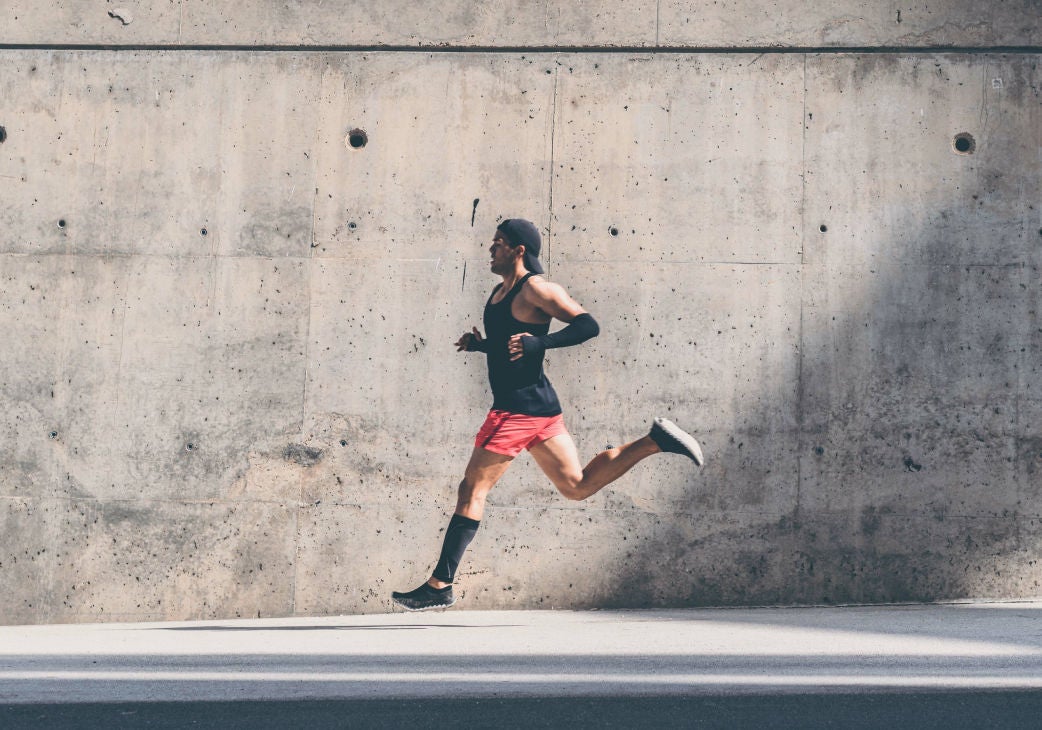 Group of people talking about data around a computer