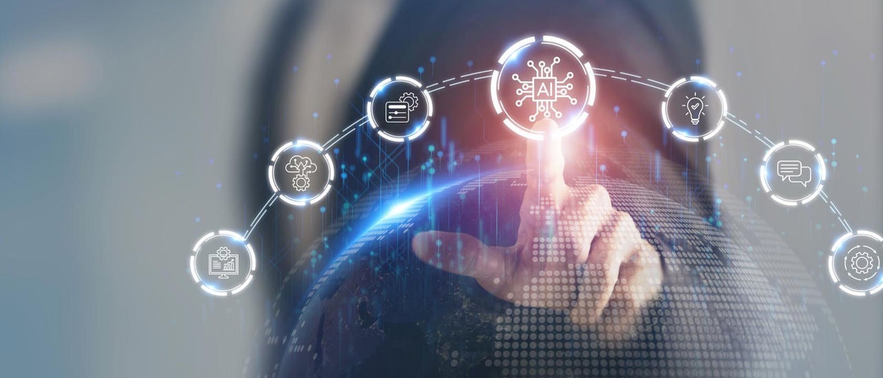 Photo illustration of a person touching an AI icon floating in a ring in front of them.