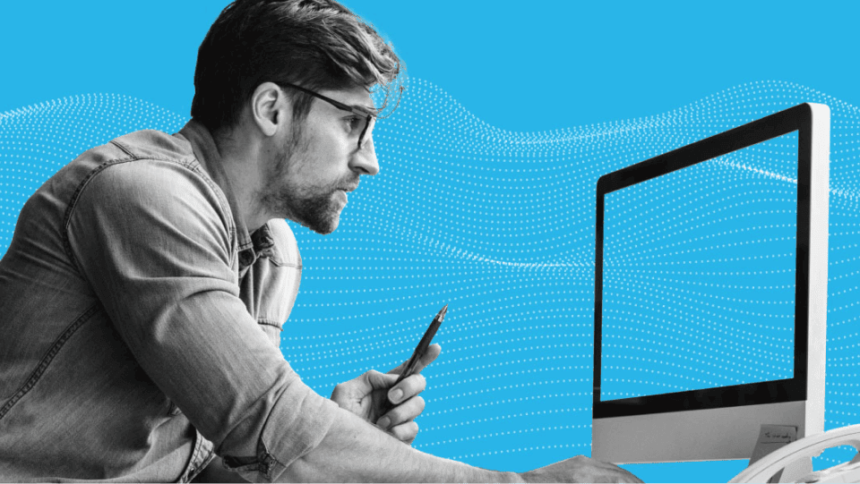 Professional looking at computer