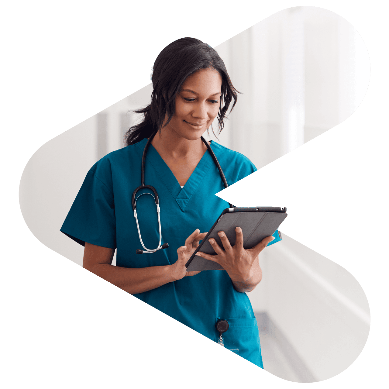 woman presenting in front of a screen with a tablet in hand