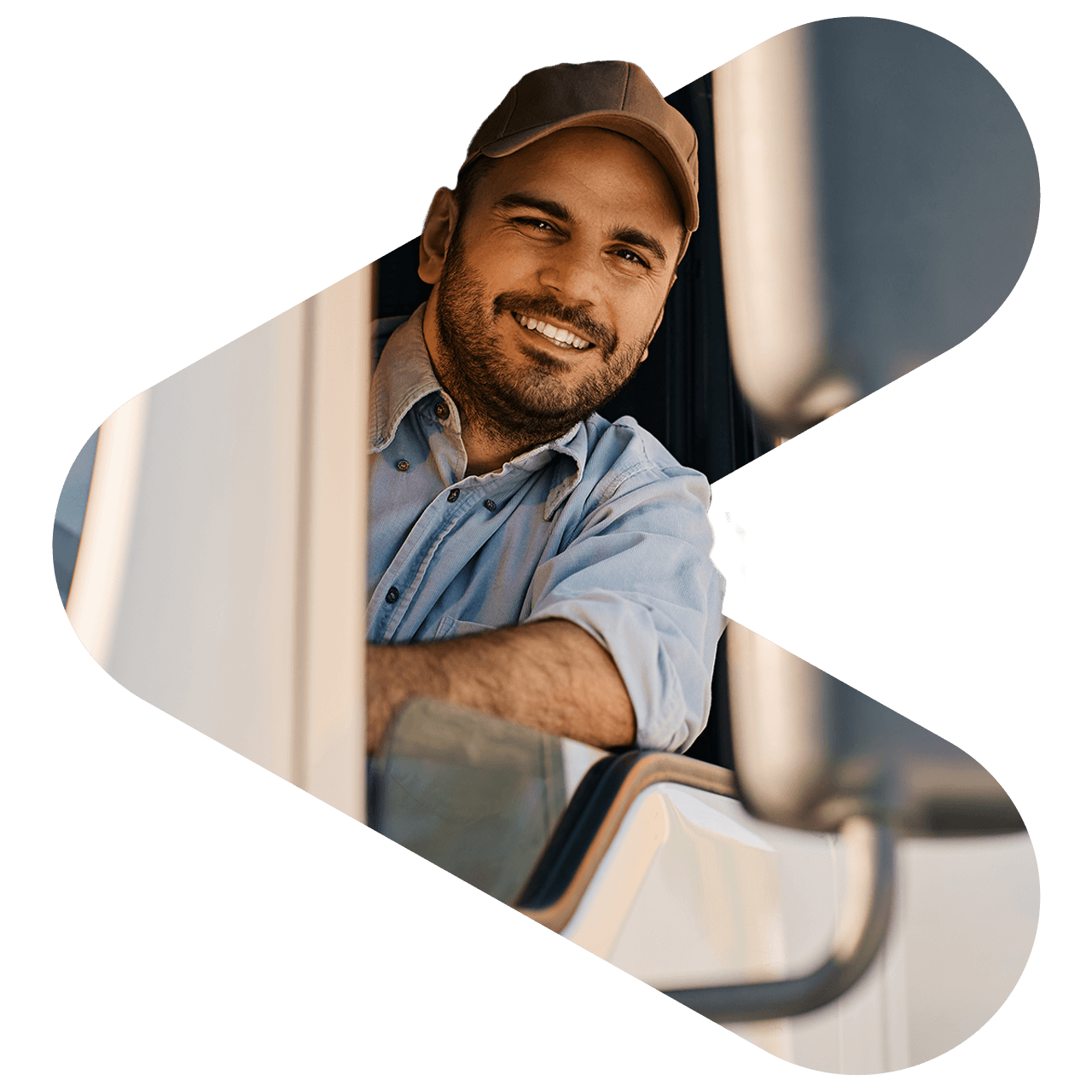 Truck driver smiling while leaning out a window